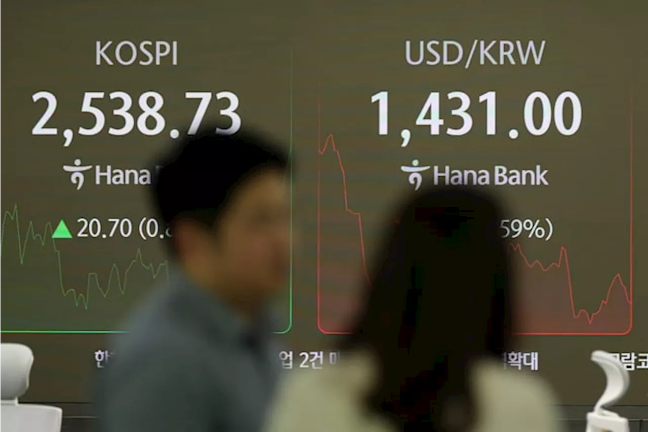 Asian Stocks Mixed After Trump's Tariff Comments Raise Uncertainty