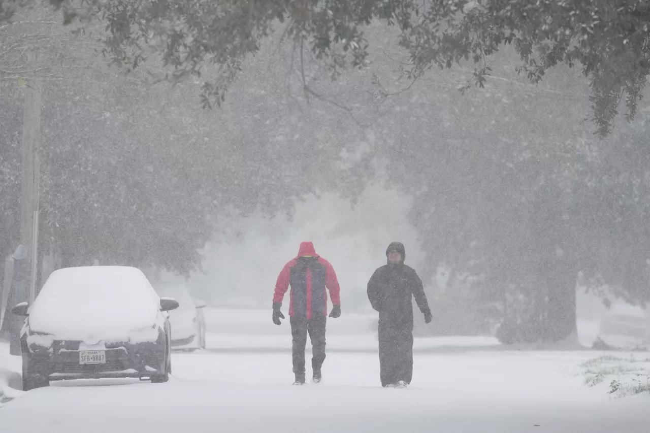 Frigid storm drops rare snow on Houston and New Orleans as Florida readies plows