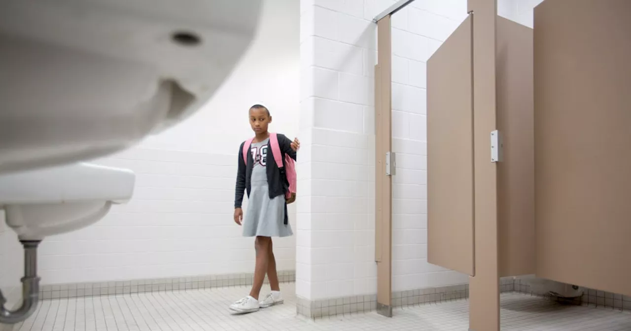 When Your Kid Holds in Their Poop: Why It Happens and What to Do