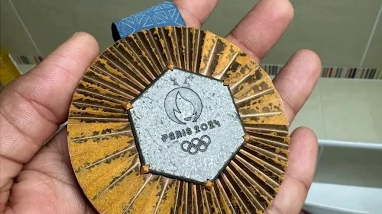 Luxury Conglomerate Denies Responsibility for Rusting Olympic Medals