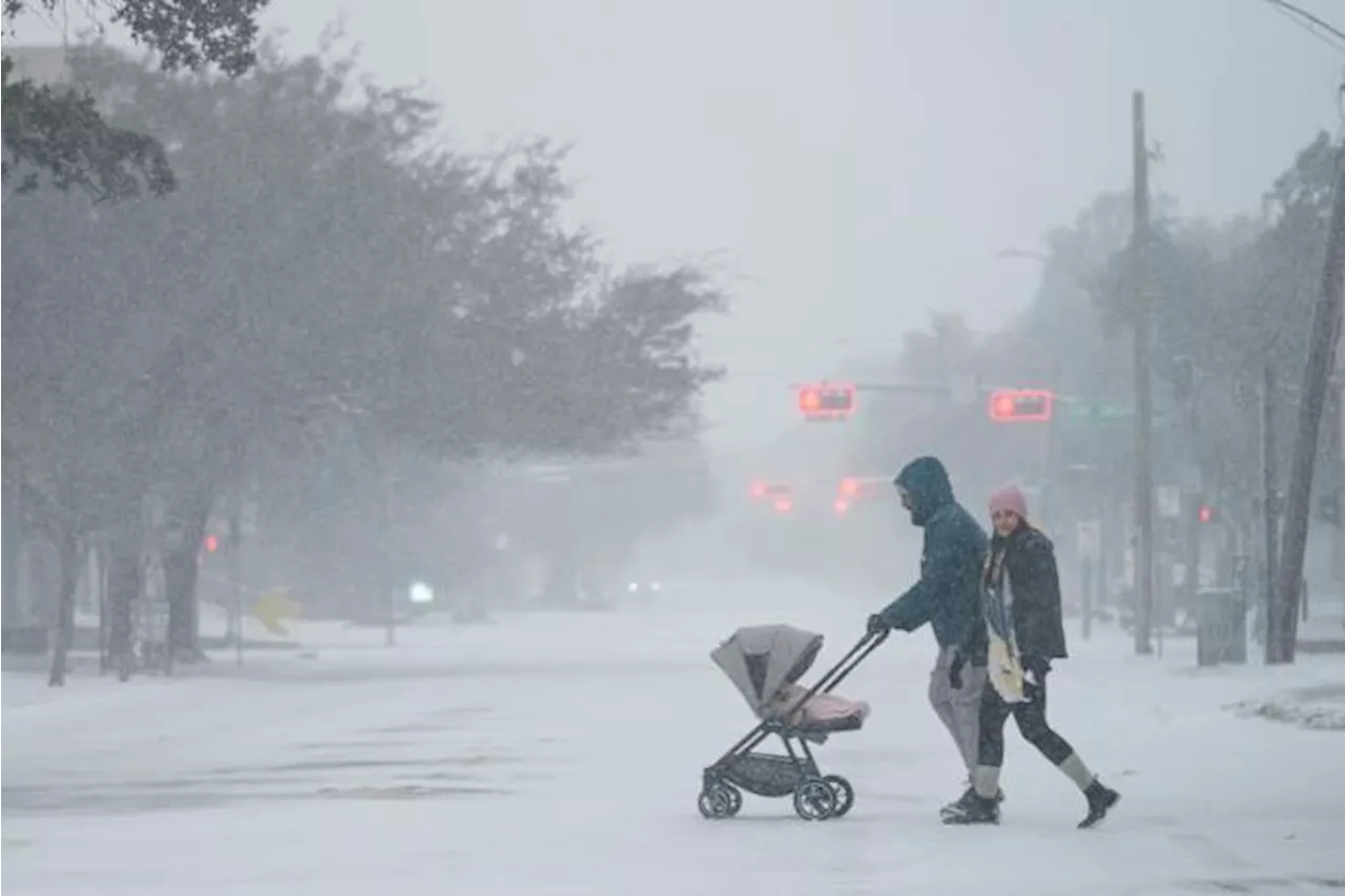 Winter storm that dropped record-breaking snow in New Orleans spreads into Florida and the Carolinas