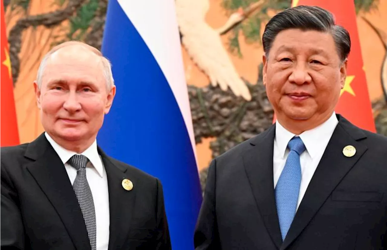 Putin and Xi praise ties, hours after Trump sworn in