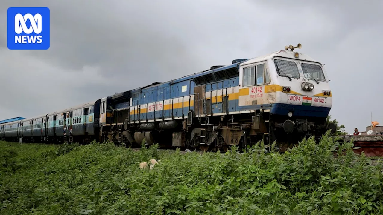 At least 11 people killed in India after disembarking onto tracks after potential false fire alarm