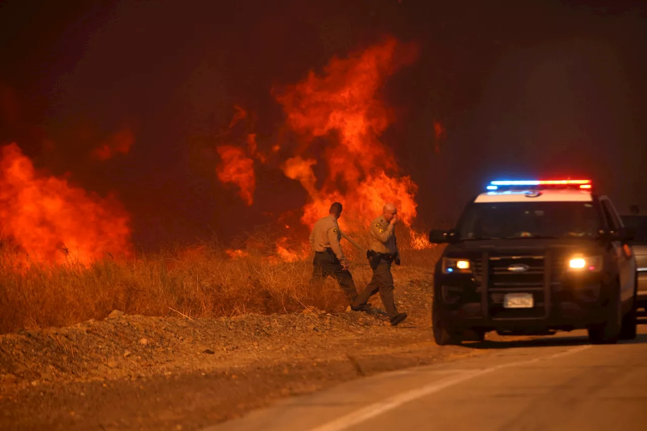 Thousands ordered to evacuate as new wildfire threatens Southern California homes