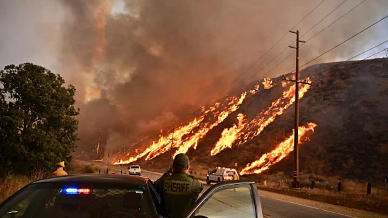 New wildfire near Los Angeles explodes to 9,400 acres, forces evacuations