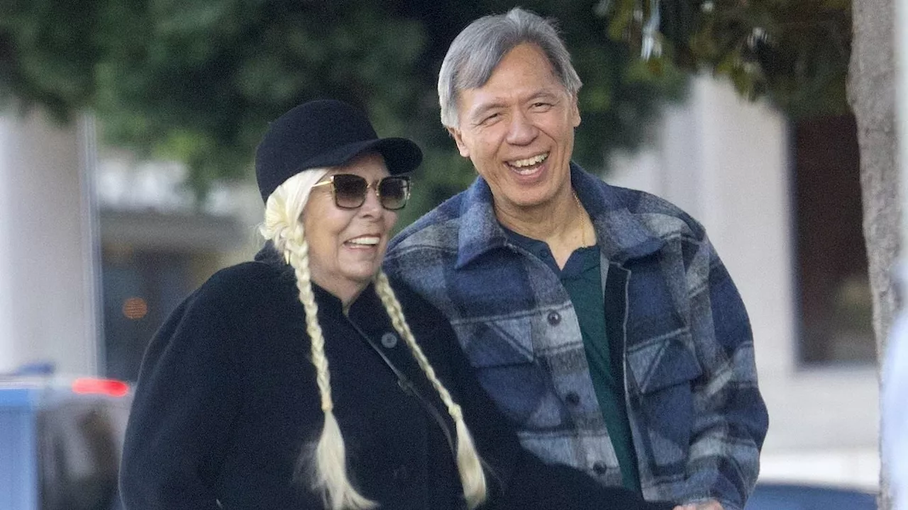 Joni Mitchell, 81, looks radiant on very rare public outing with a male pal in Beverly Hills