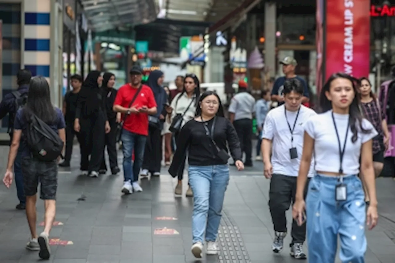 KL immigration nabs 176 illegal workers in Bukit Bintang raid last night