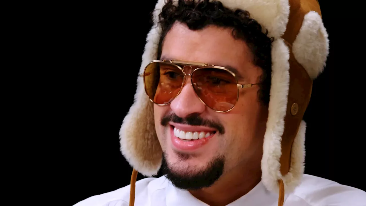 Bad Bunny Tries to Conquer the Heat on 'Hot Ones' but Bites the Dust