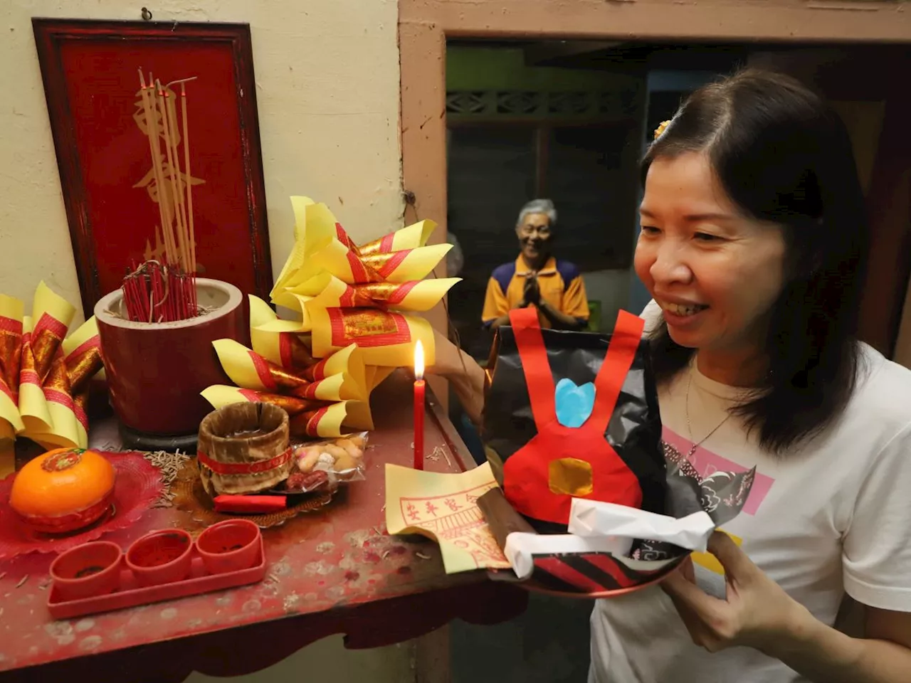 Chinese families send off Kitchen God with sweet treats in time-honoured tradition ahead of CNY