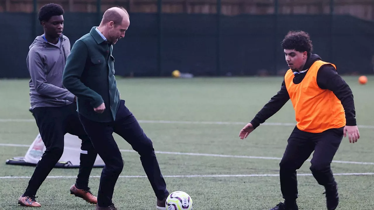 Prince William plays football with teens but barely gets a touch: ‘I’m not going to go around slide tac...