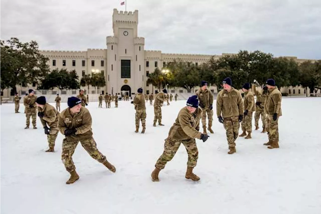 Sledding on boogie boards, ice hockey on Canal Street: The Gulf Coast embraces a rare snow day