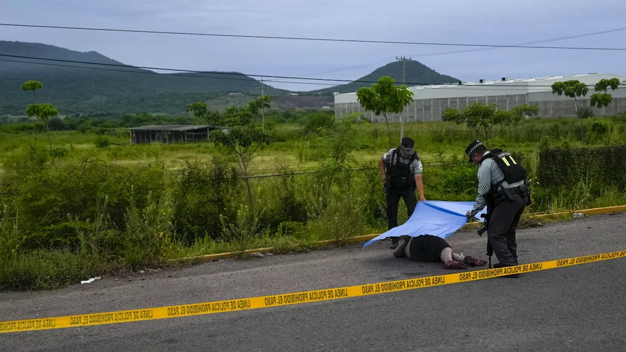 Thousands protest the killing of 2 young brothers in Mexico's troubled Sinaloa state