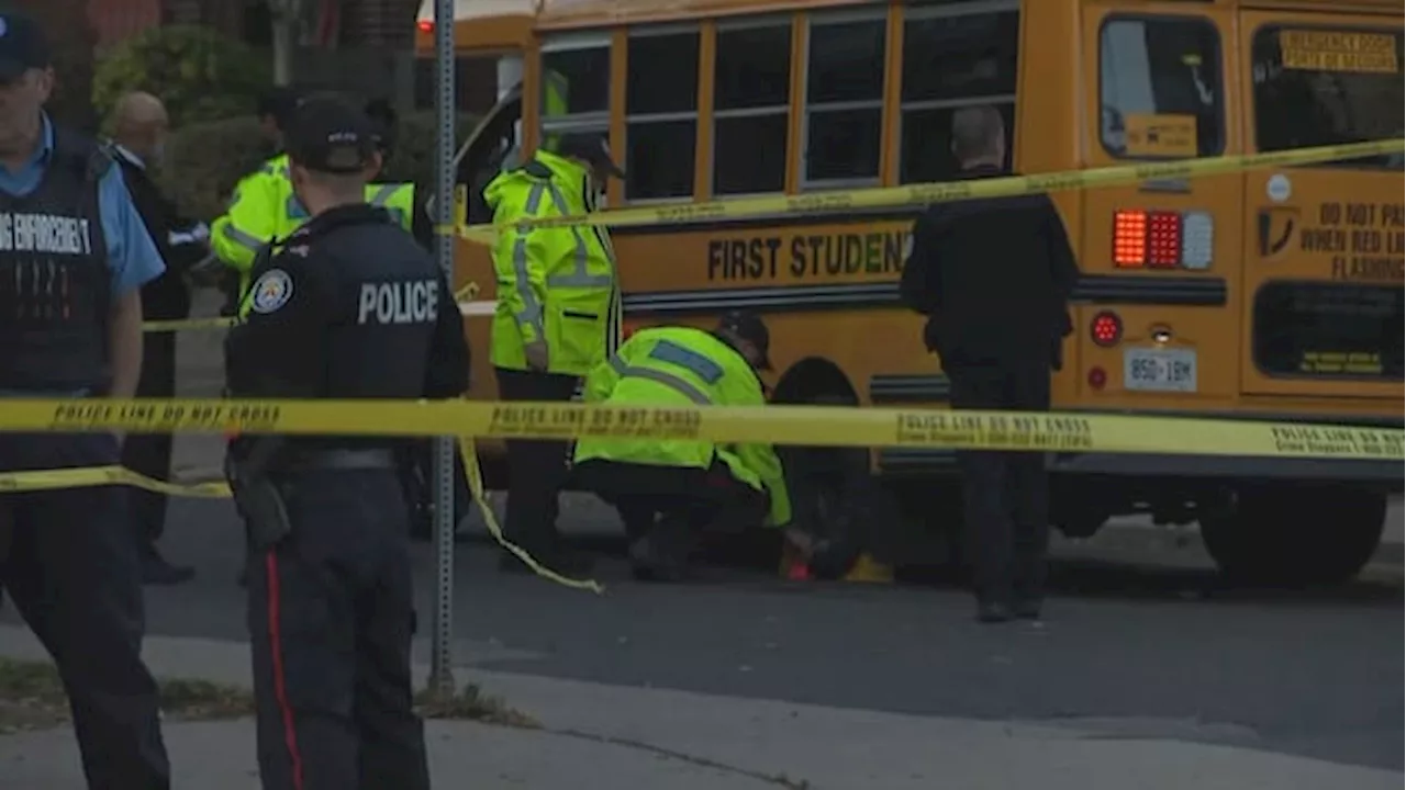 Man charged in death of woman, 22, struck by school bus