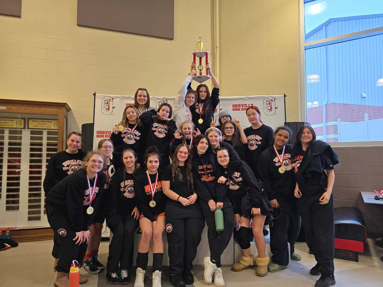 Normandy High School girls wrestling team wins first individual tournament