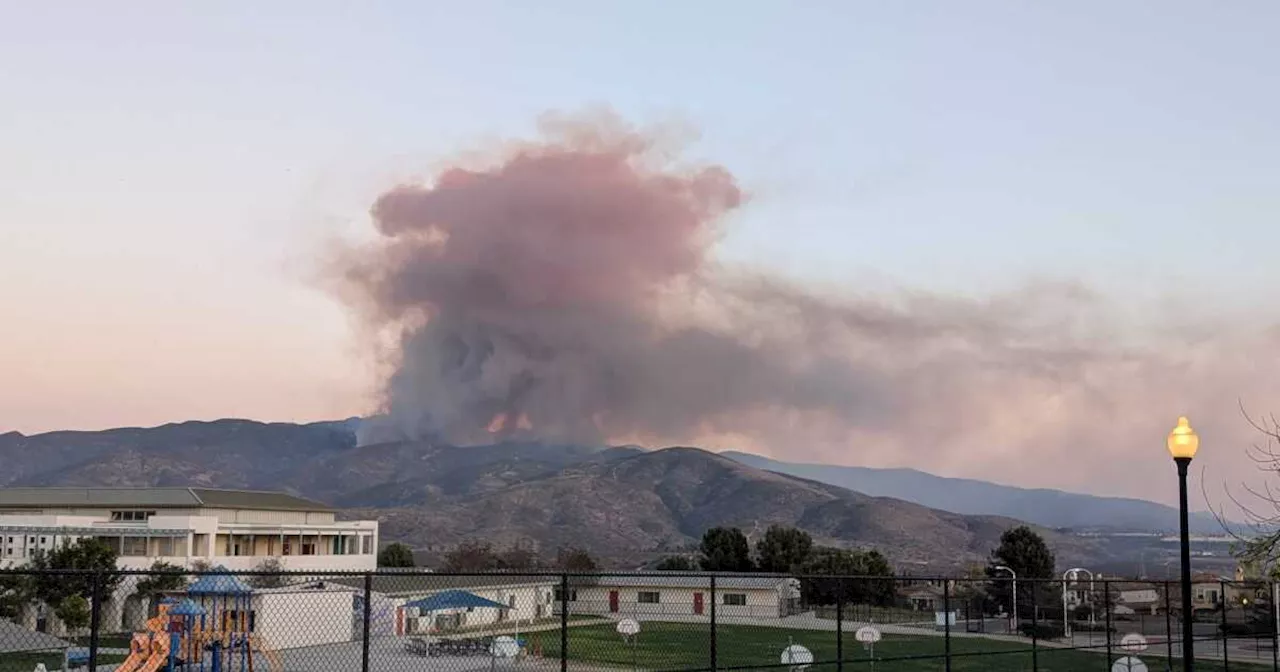 Wind-stoked wildfire erupts in Otay Mountain area