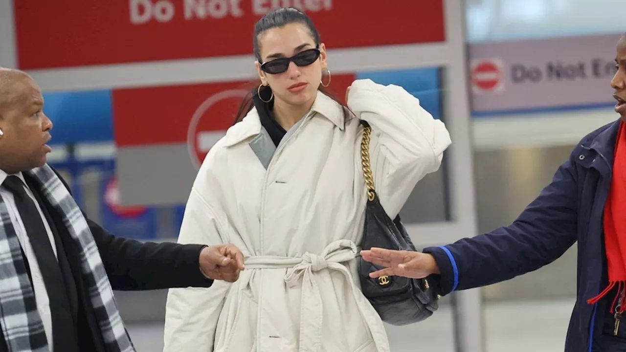 Dua Lipa's Airport Chic: The Pop Star's Luxurious Travel Ensemble