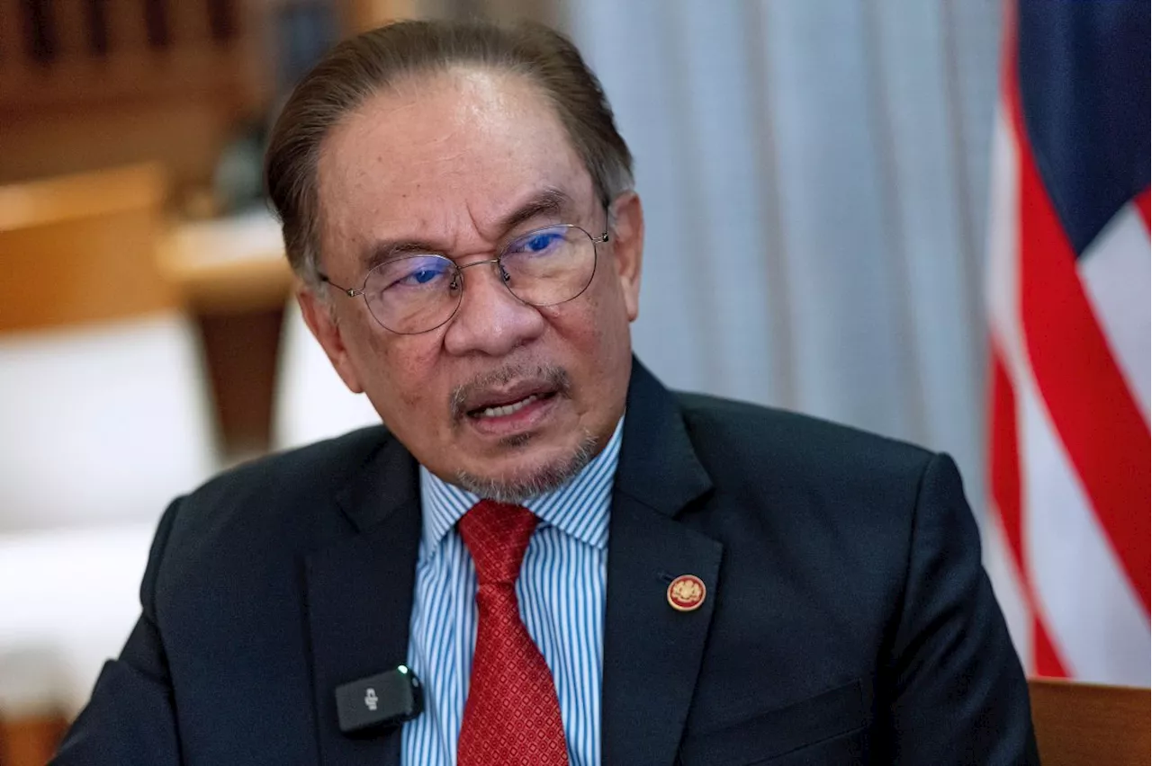 Anwar Ibrahim Urges Malaysian Urban Planners to Preserve Identity in Tech-Driven Future