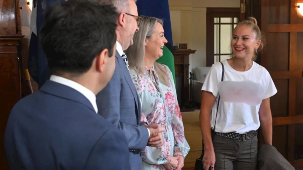 Grace Tame makes controversial statement with T-shirt slogan at Australian of the Year morning tea with Anthony Albanese