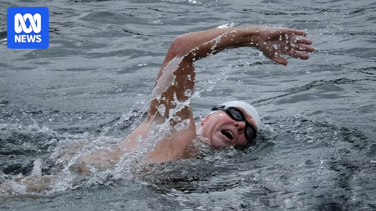 Michael 'Murph' Renford completes Derwent River Big Swim marathon, 50 years after his father Des first swam it