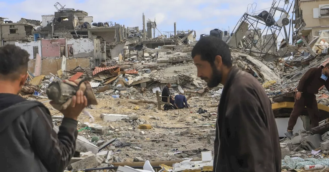 Palestinians Search Through Gaza Rubble After Israeli Offensive