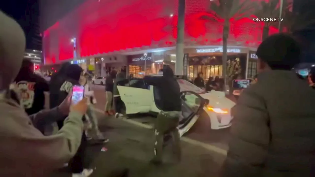 Self-Driving Waymo SUV Vandalized During Street Takeover in Los Angeles