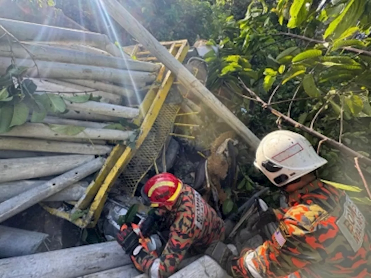 Driver buried alive in Ranau after trailer truck plunges into 50-metre ravine, says Sarawak Fire Dept