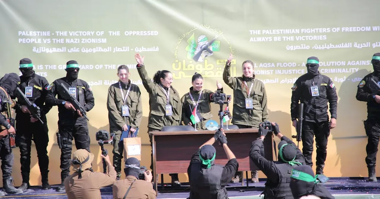 Hamas hands over Israeli hostages after parading them in front of crowd