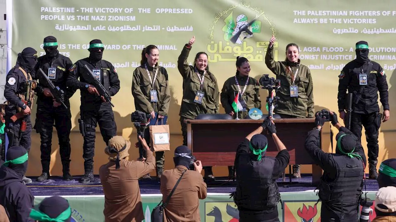 Hamas Displays Seized Israeli Tavor Rifles During Soldier Hand-Over in Gaza City