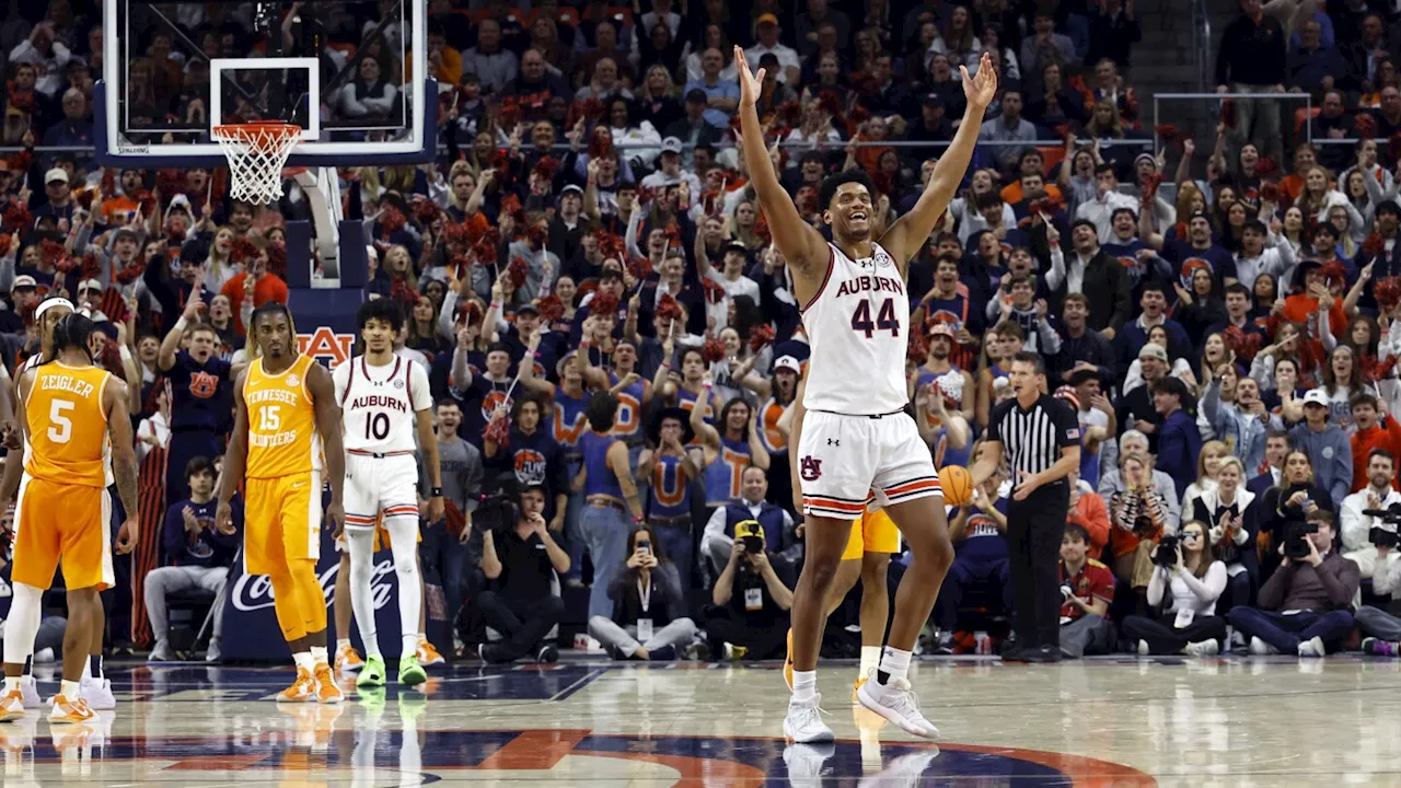 No. 1 Auburn slips past No. 6 Tennessee 53-51 and extends its winning streak to 11 games