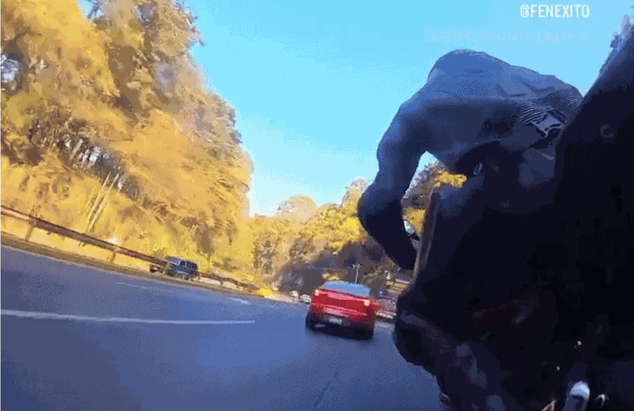 Motorcyclist Cheats Death in Terrifying Overtake Crash