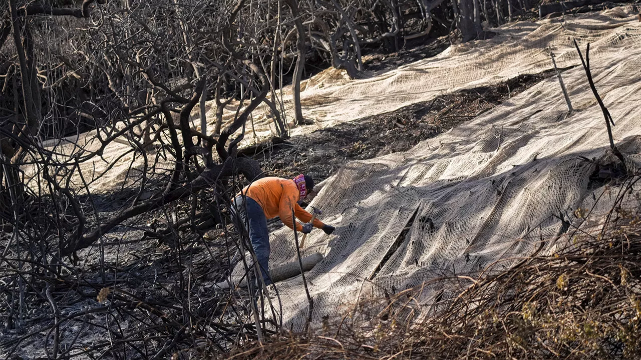 Rain in California helps firefighters respond to wildfires but presents risk of toxic ash runoff