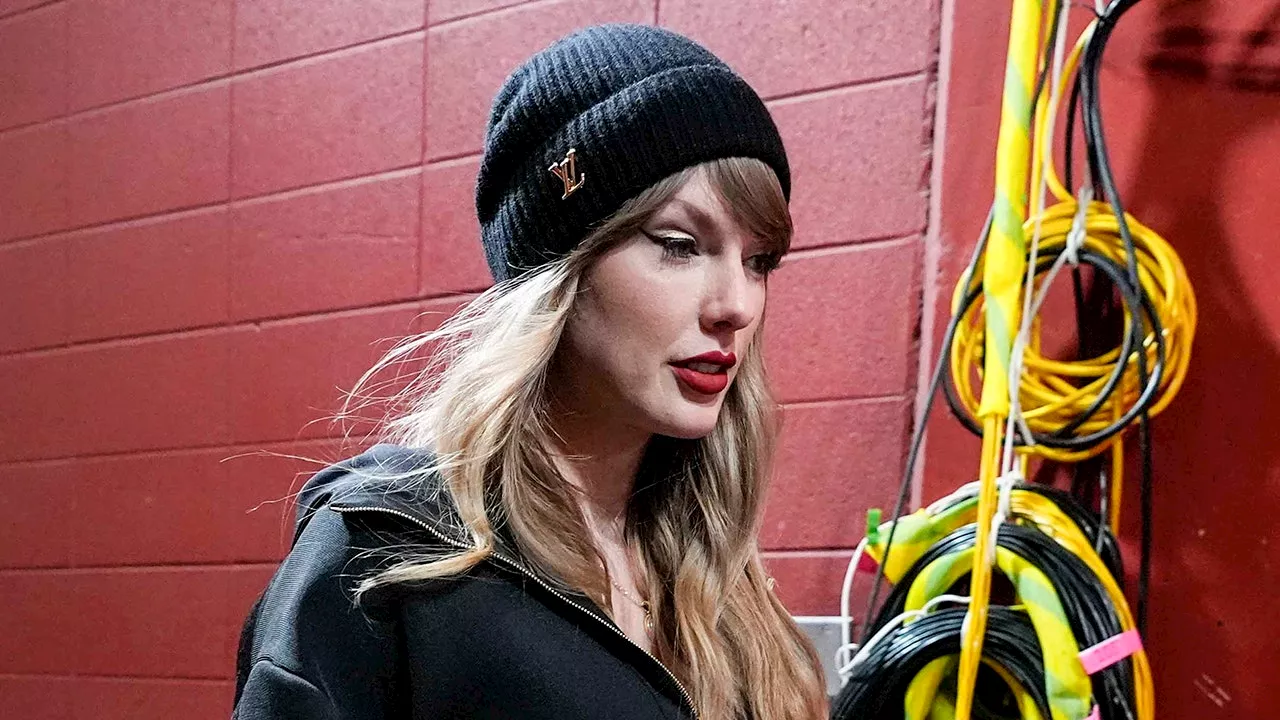 Taylor Swift arrives at Chiefs-Bills AFC Championship in black Louis Vuitton outfit