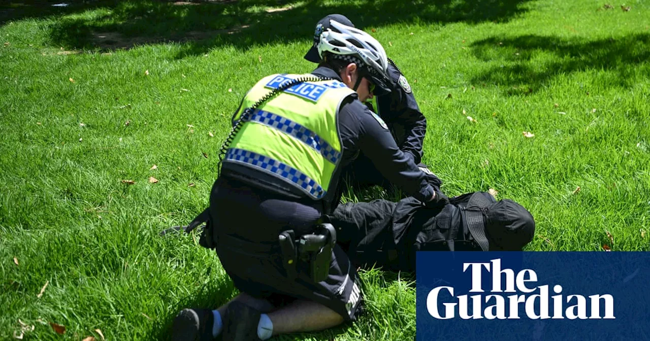 Man arrested in South Australia for displaying Nazi symbol as Greens call attempts block Invasion Day rally ‘sickening’