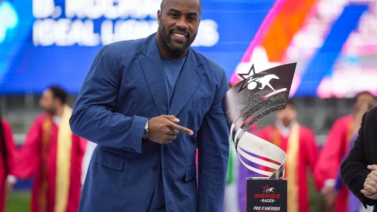 Teddy Riner en admiration devant les chevaux du Prix d'Amérique