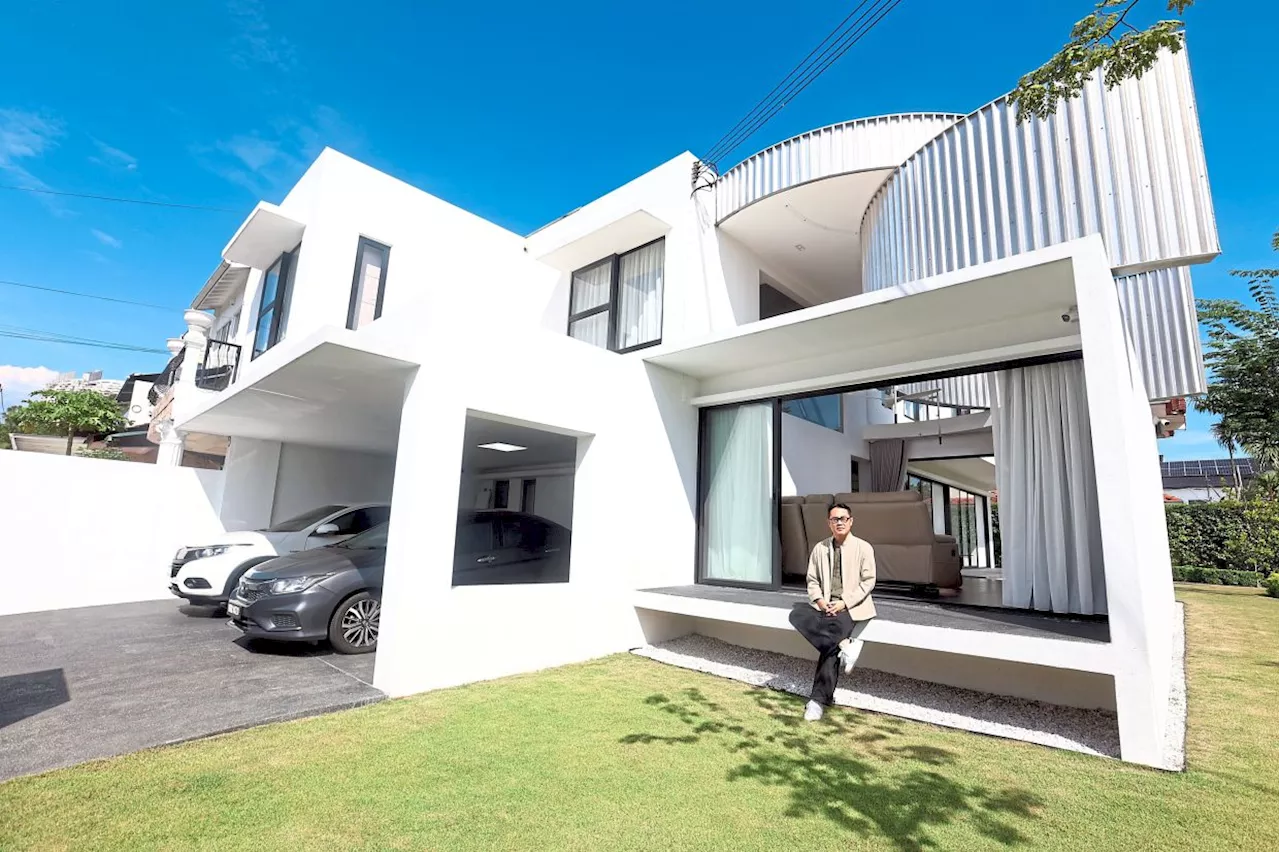 Malaysian terrace home transformed into minimalist house with innovative Moon Doors