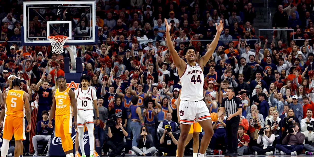 No. 1 Auburn slips past No. 6 Tennessee 53-51 and extends its winning streak to 11 games