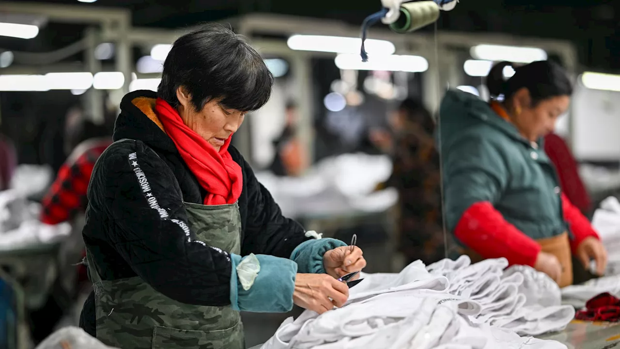 China PMI surprises as factory activity contracts in January; December industrial profits jump