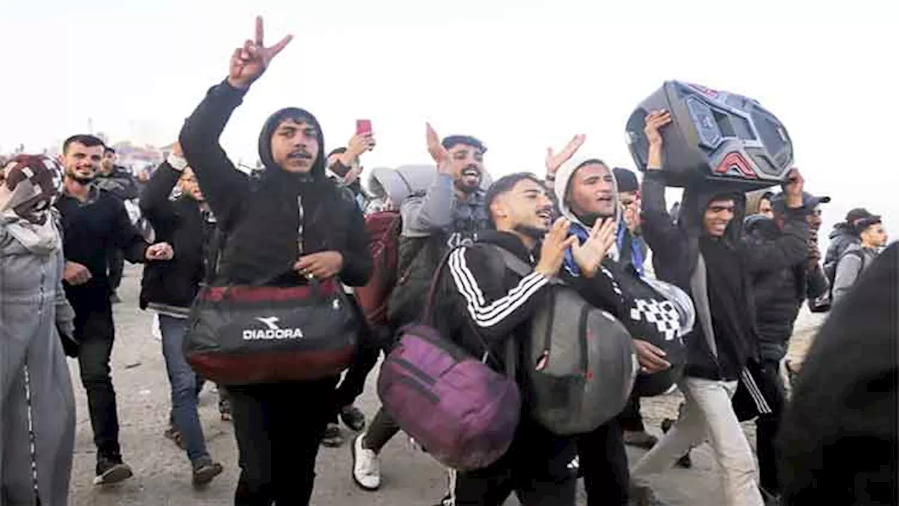 Tens of thousands return to devastated northern Gaza as Israel lifts its closure under truce