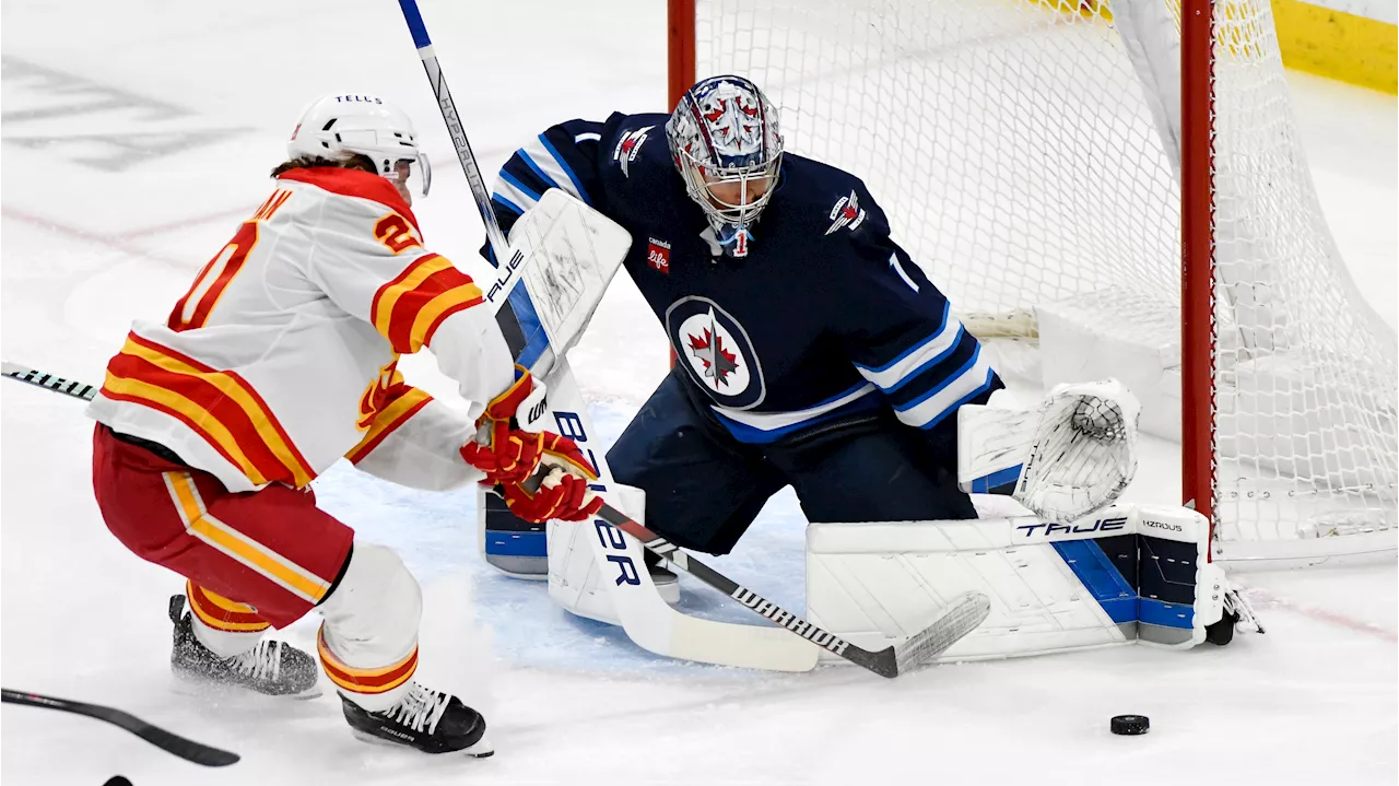 Jets' Comrie puts 'curse' to rest with win over Flames