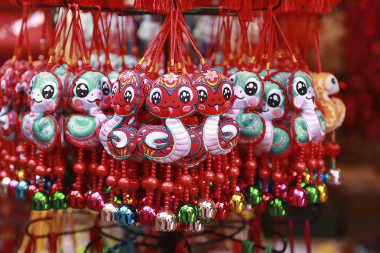 Snake Decorations Slither Down at Lunar New Year Markets