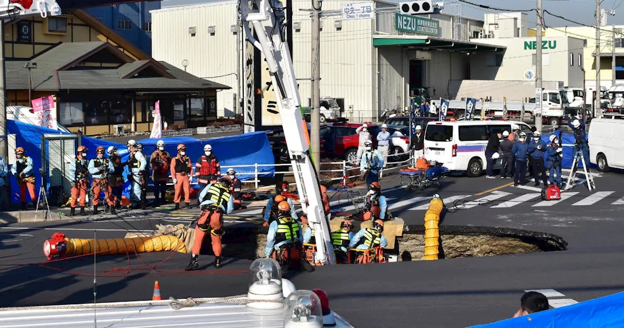 Truck Driver Rescued After Collapsing Sinkhole Near Tokyo