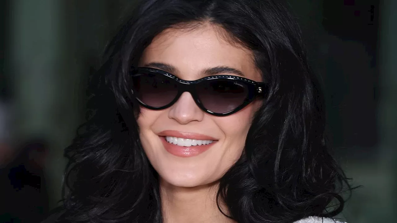 Kylie Jenner Stuns in White Boucle at Chanel's Paris Fashion Week Show