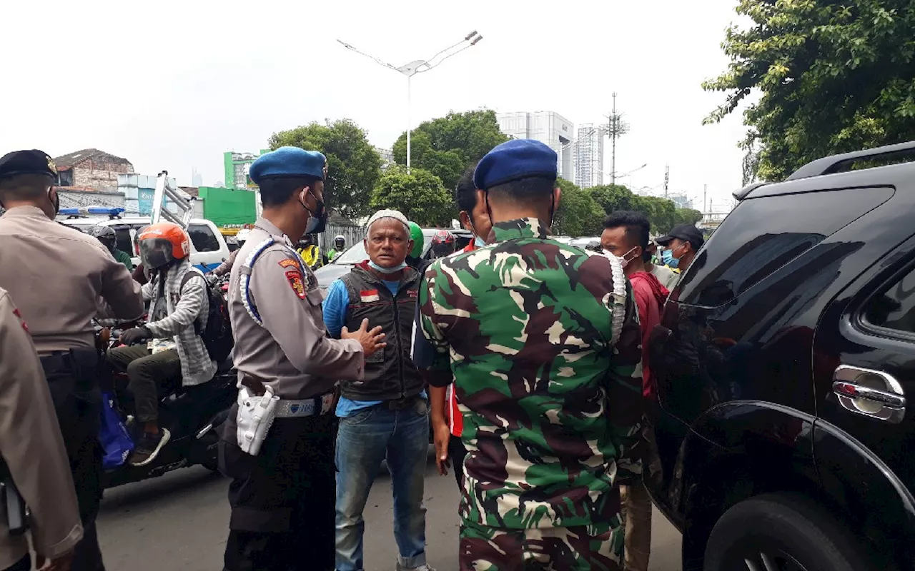 4 Juru Parkir Liar Ditangkap Saat Libur Panjang Isra Mikraj - Imlek