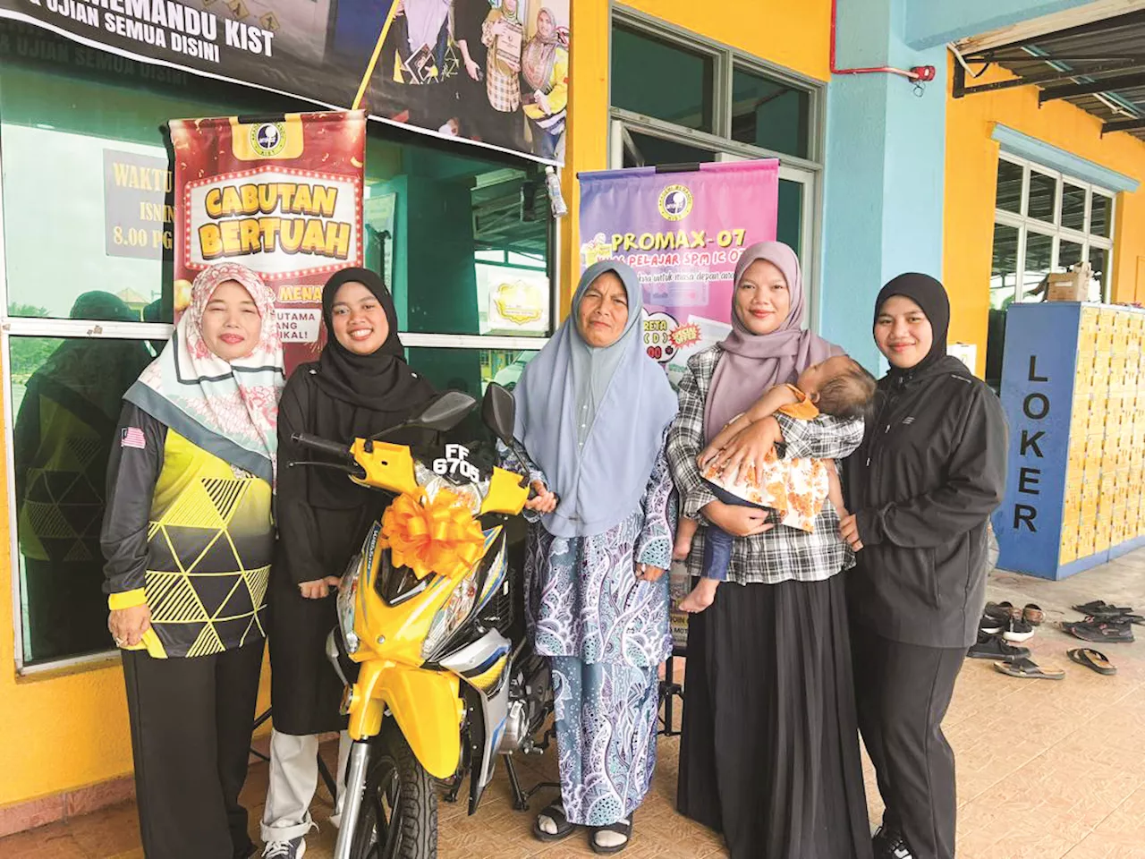 Getah Tapper Wins Motorbike in Lucky Draw After Passing Driving Test