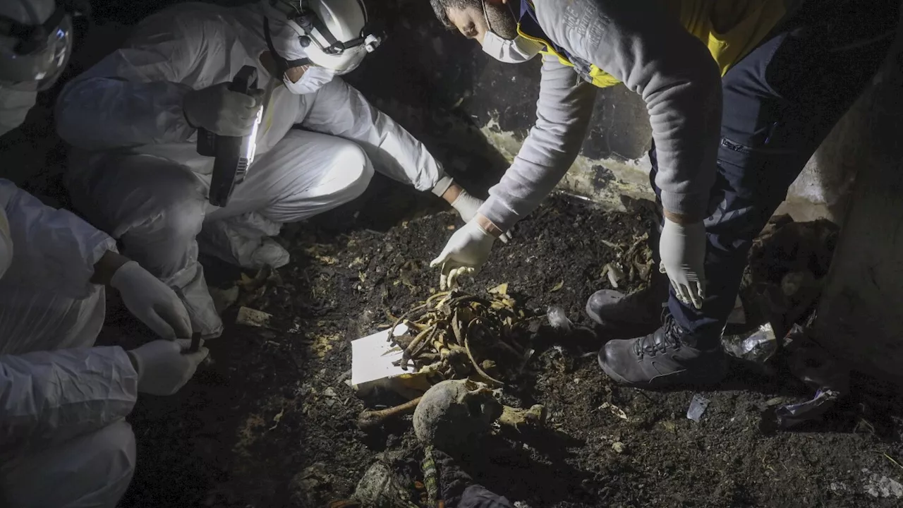 White Helmets Unearth Remains of at Least 26 Victims in Syria