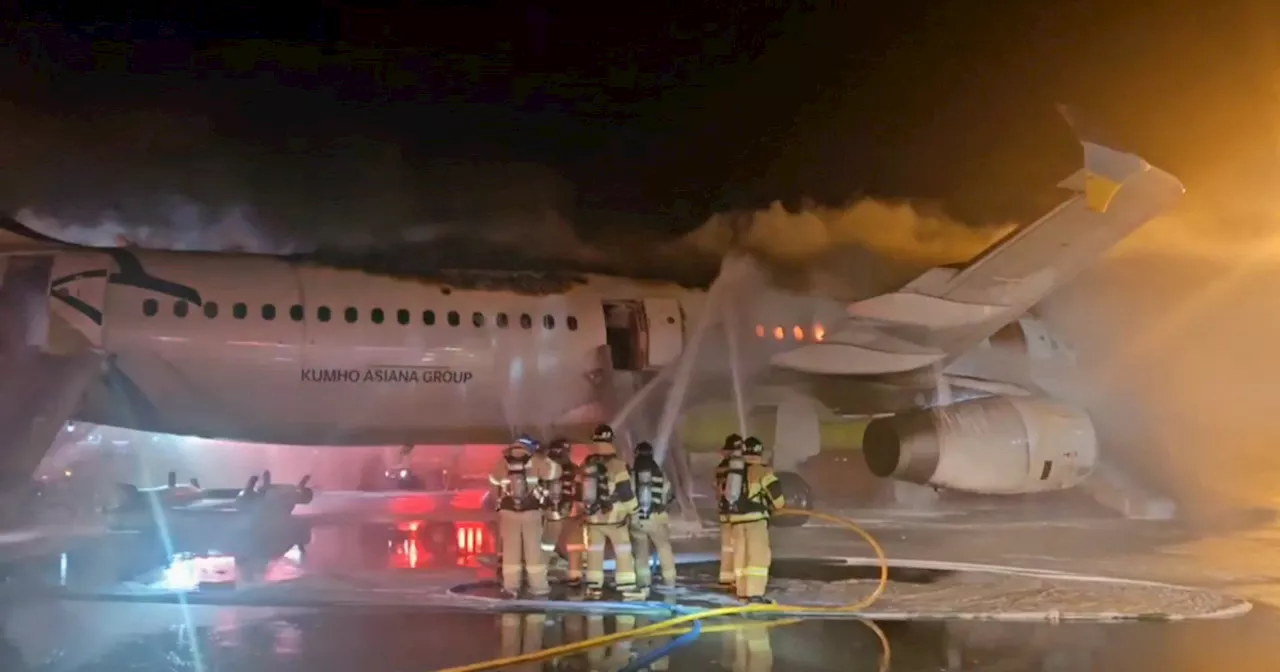 Passengers and crew evacuated after Air Busan plane caught fire in South Korea airport