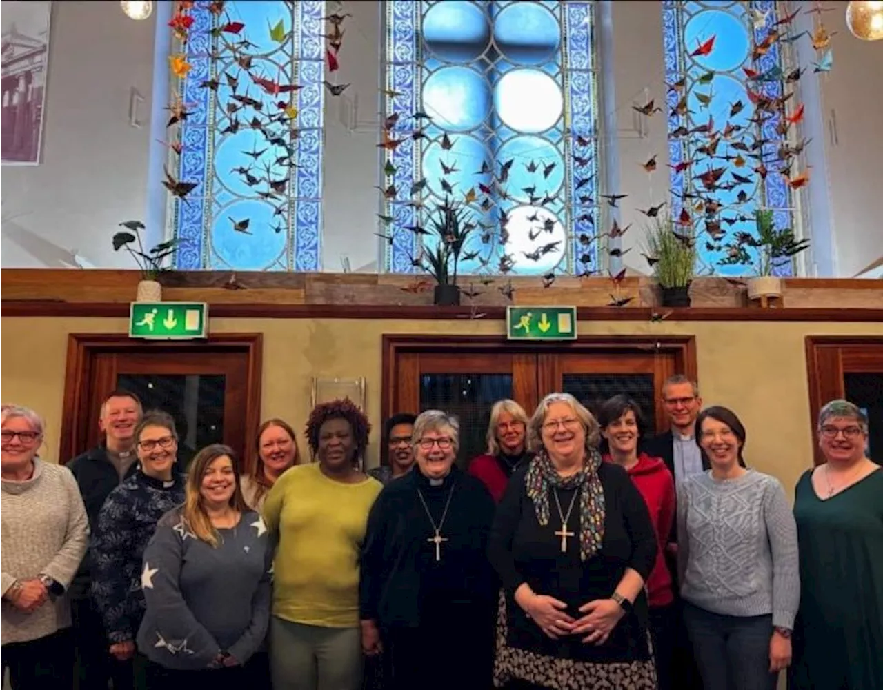 Origami Birds Bring Peace Prayer to Preston Cafe