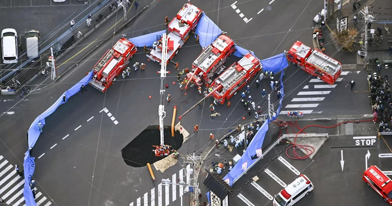 Desperate Rescue Efforts Underway After Japanese Driver Falls Into Sinkhole