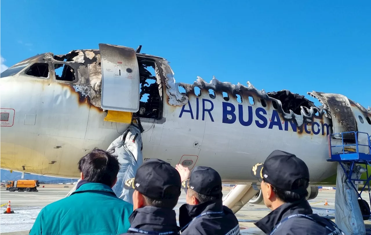 김해공항 에어부산 항공기 화재, 승객 짐에서 연기 목격