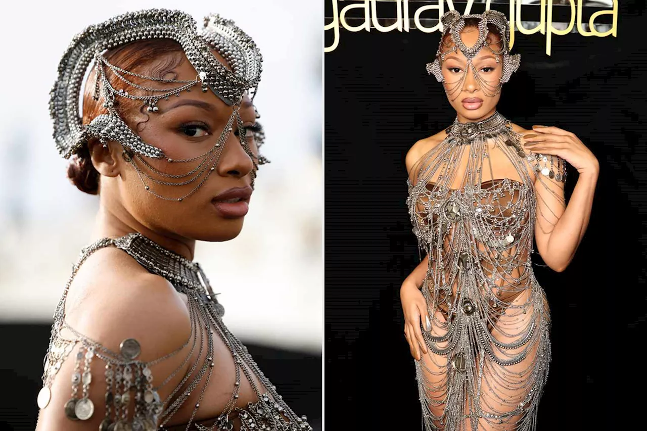 Megan Thee Stallion Takes Over Paris in a Studded Headpiece, Nearly Nude Thong Bodysuit and Metal Harness